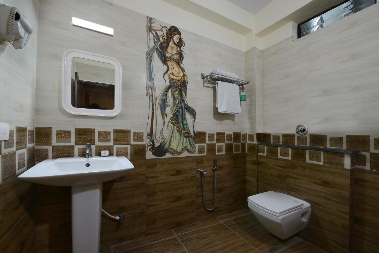 Capital O Hotel Samanvi International Belur  Экстерьер фото